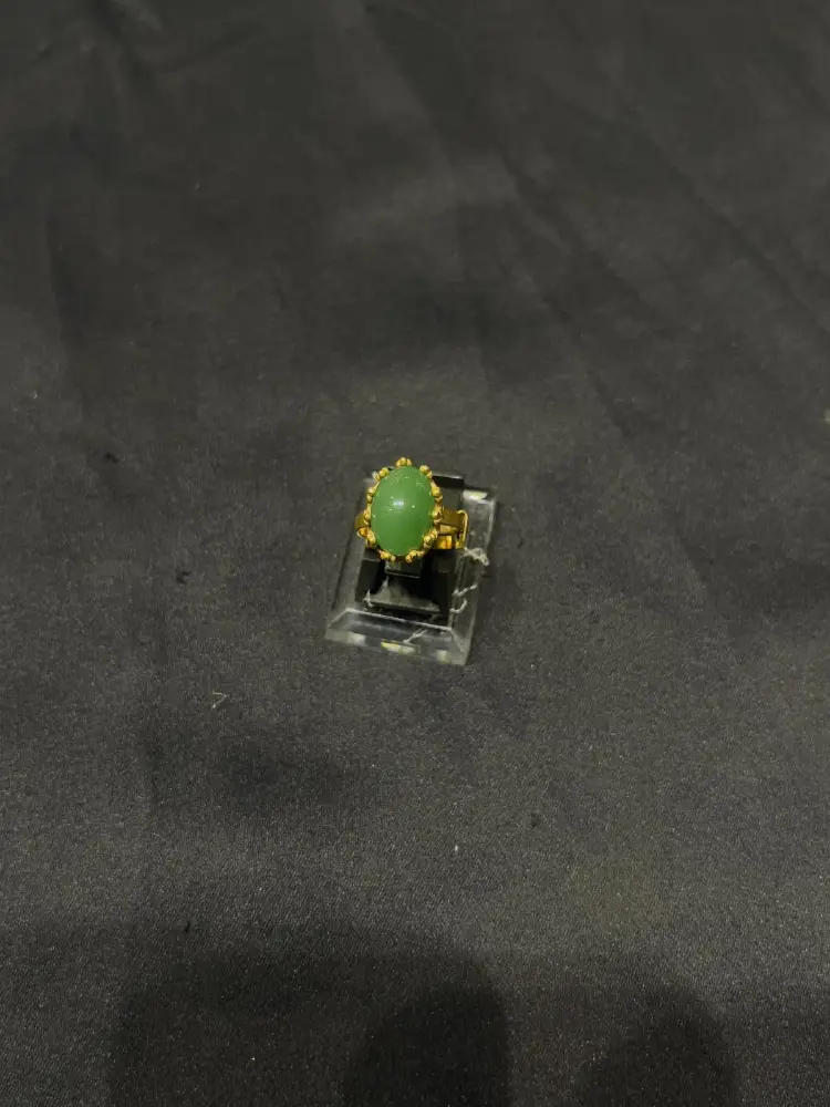 Goldplated adjustable Ring with green stone