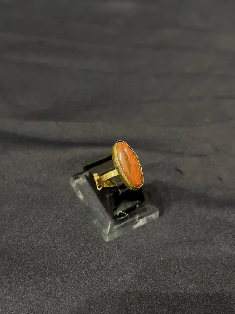 Goldplated adjustable Ring with brown stone