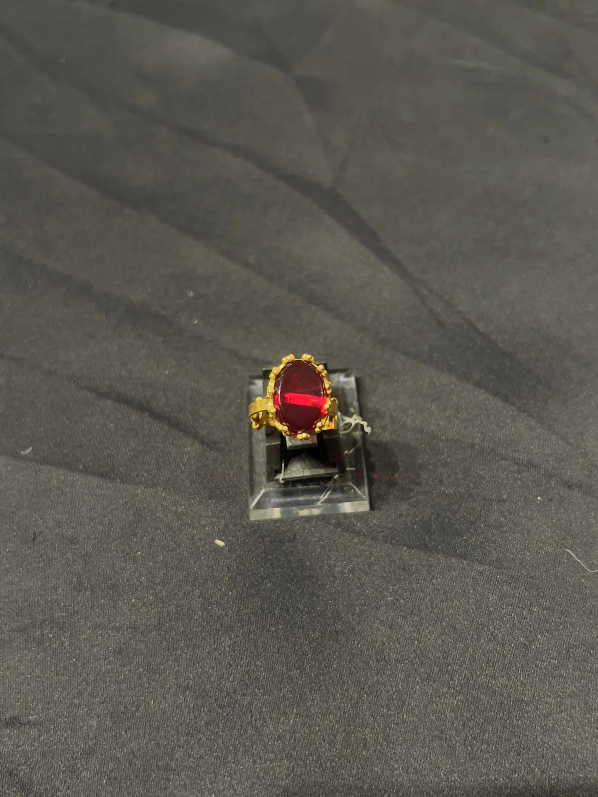 Goldplated adjustable Ring with red stone