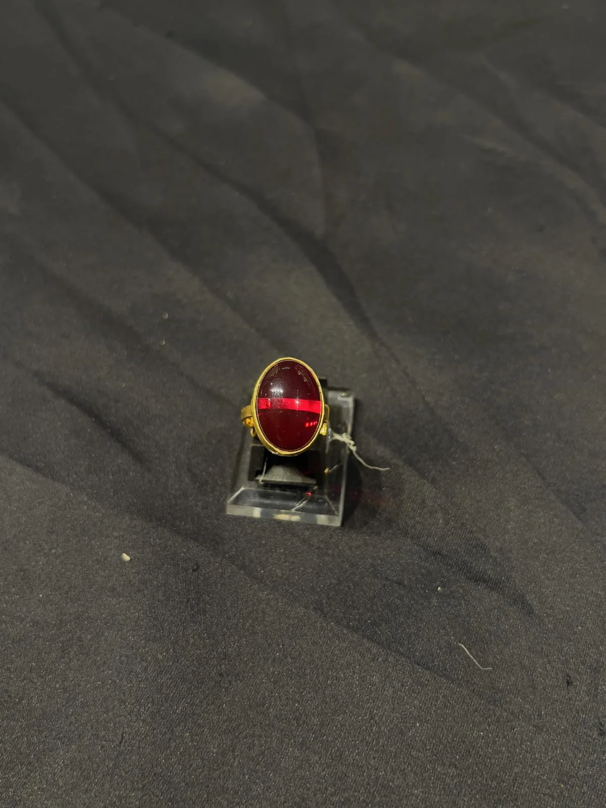 Goldplated adjustable Ring with red stone