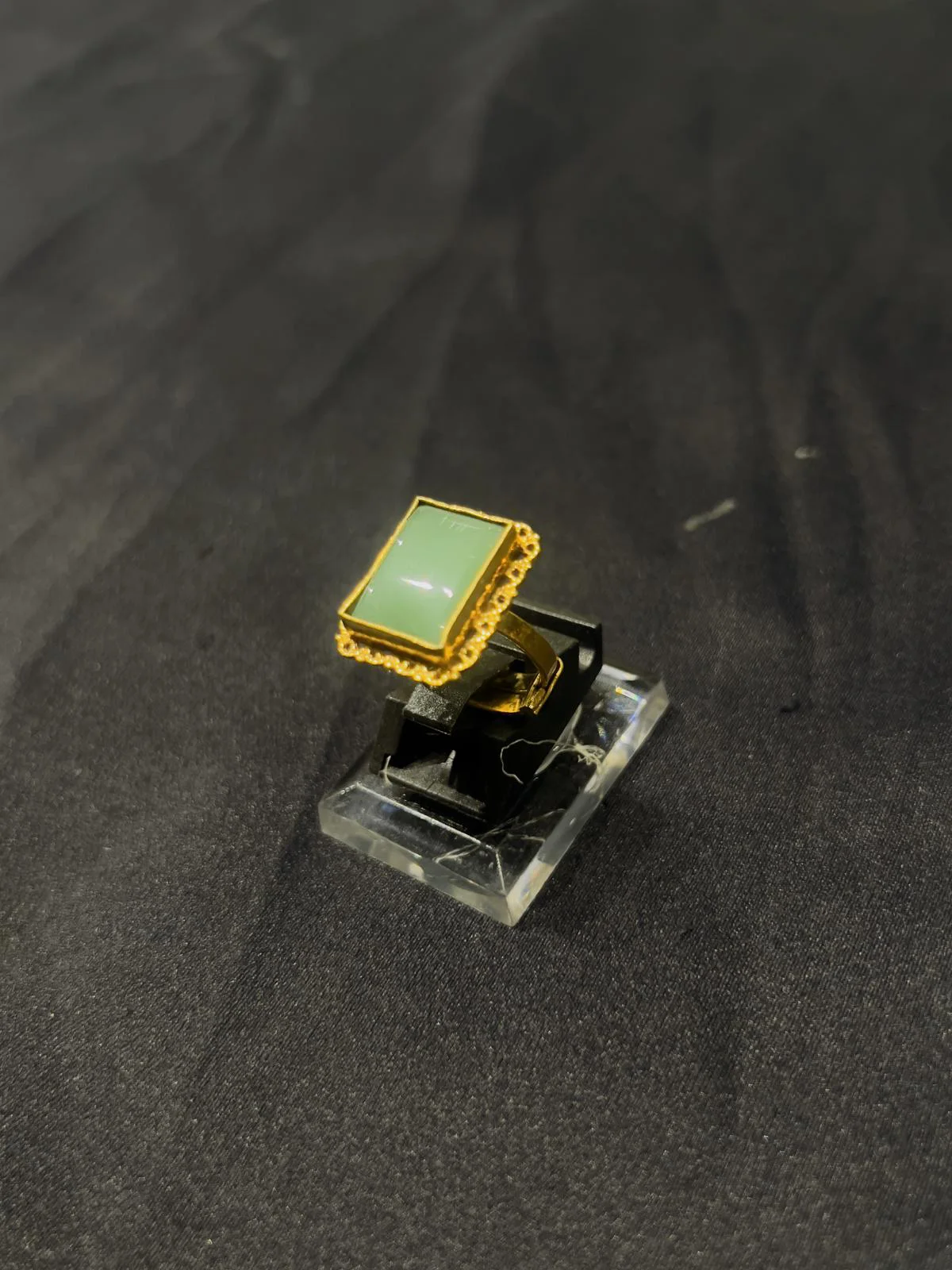 Goldplated adjustable Ring in green stone