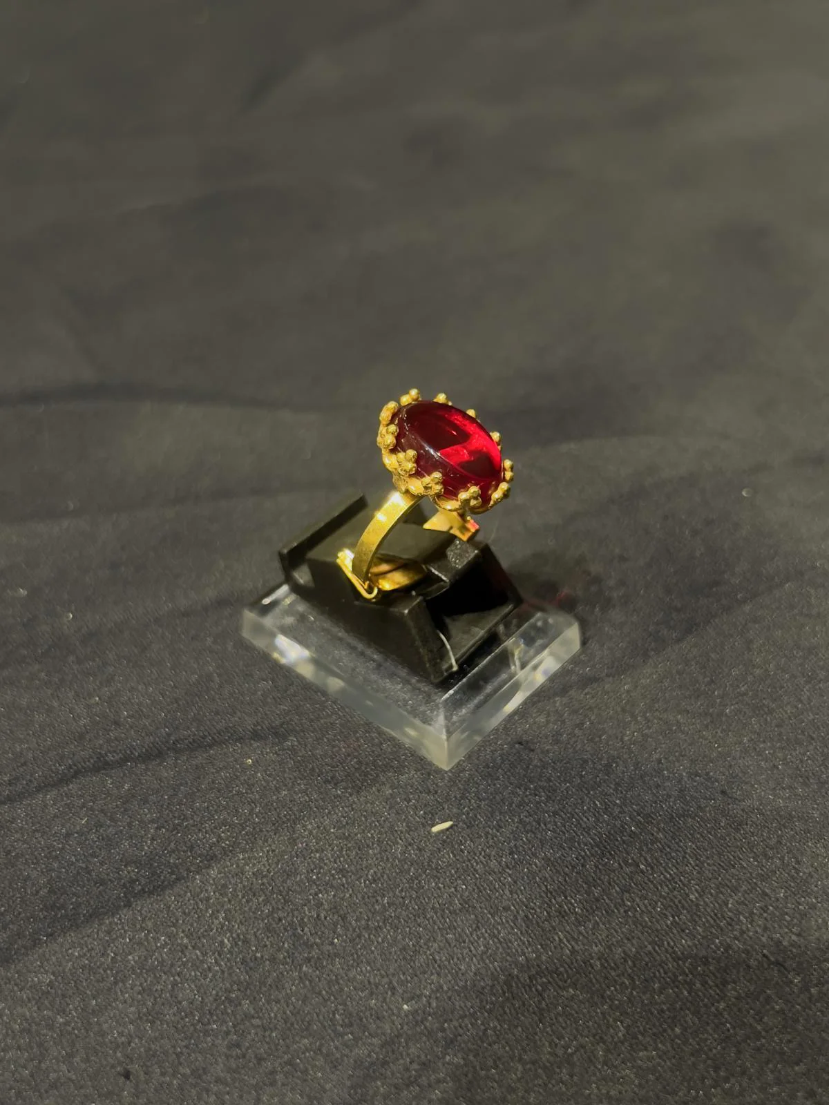 Goldplated adjustable Ring with red stone