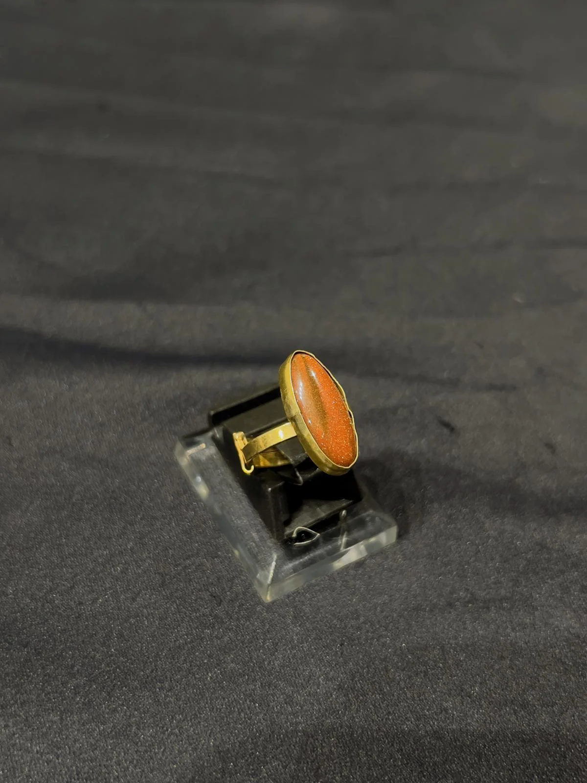 Goldplated adjustable Ring with brown stone