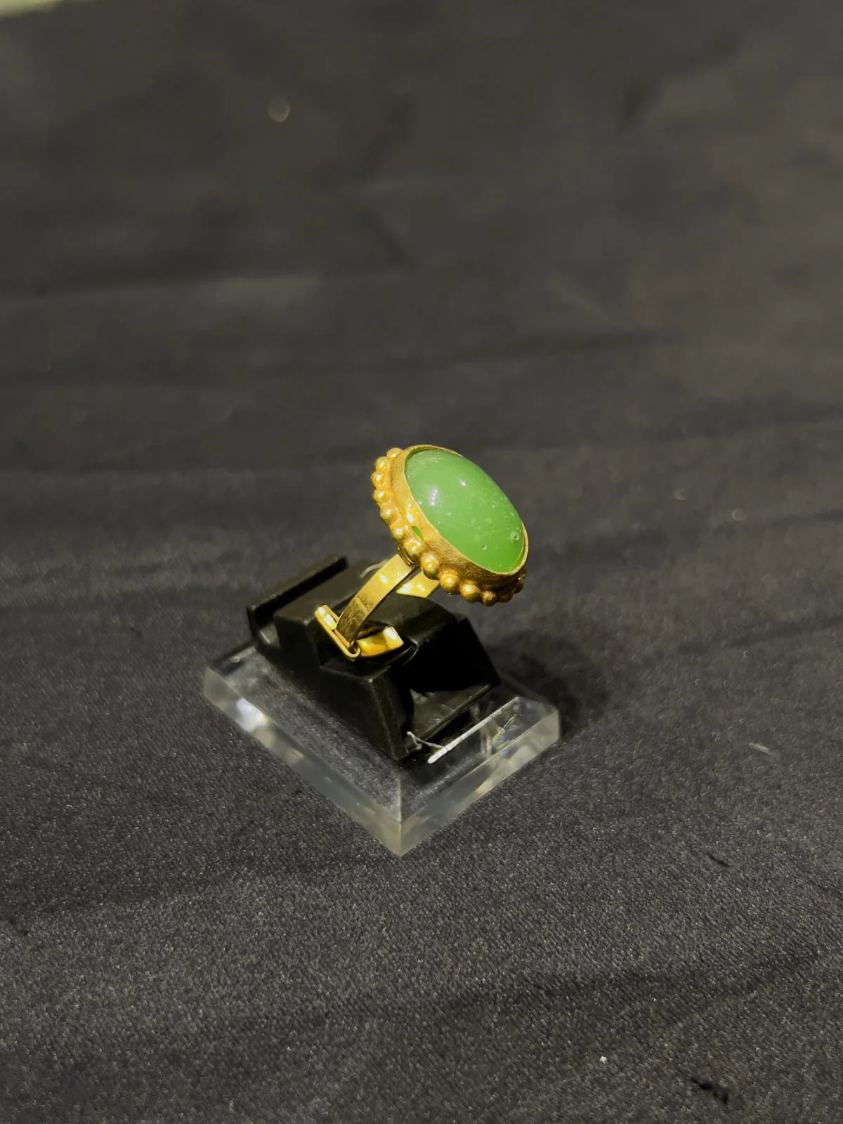 Goldplated adjustable Ring with green stone
