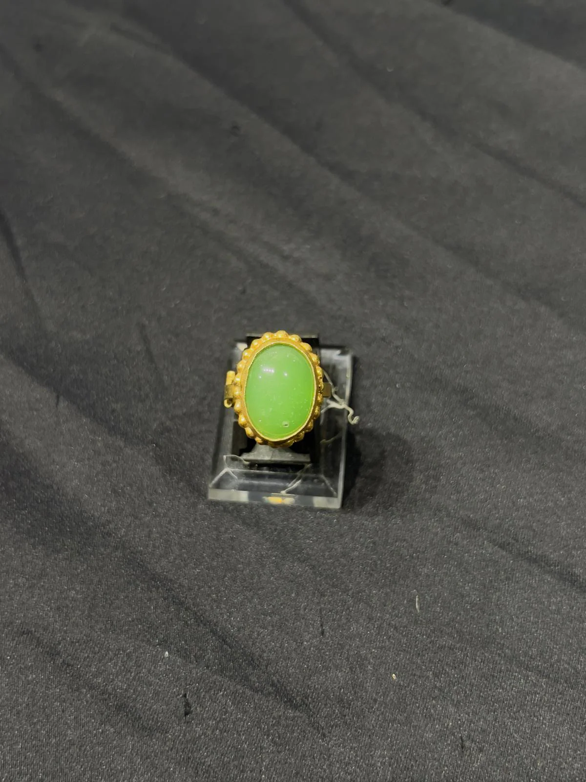 Goldplated adjustable Ring with green stone