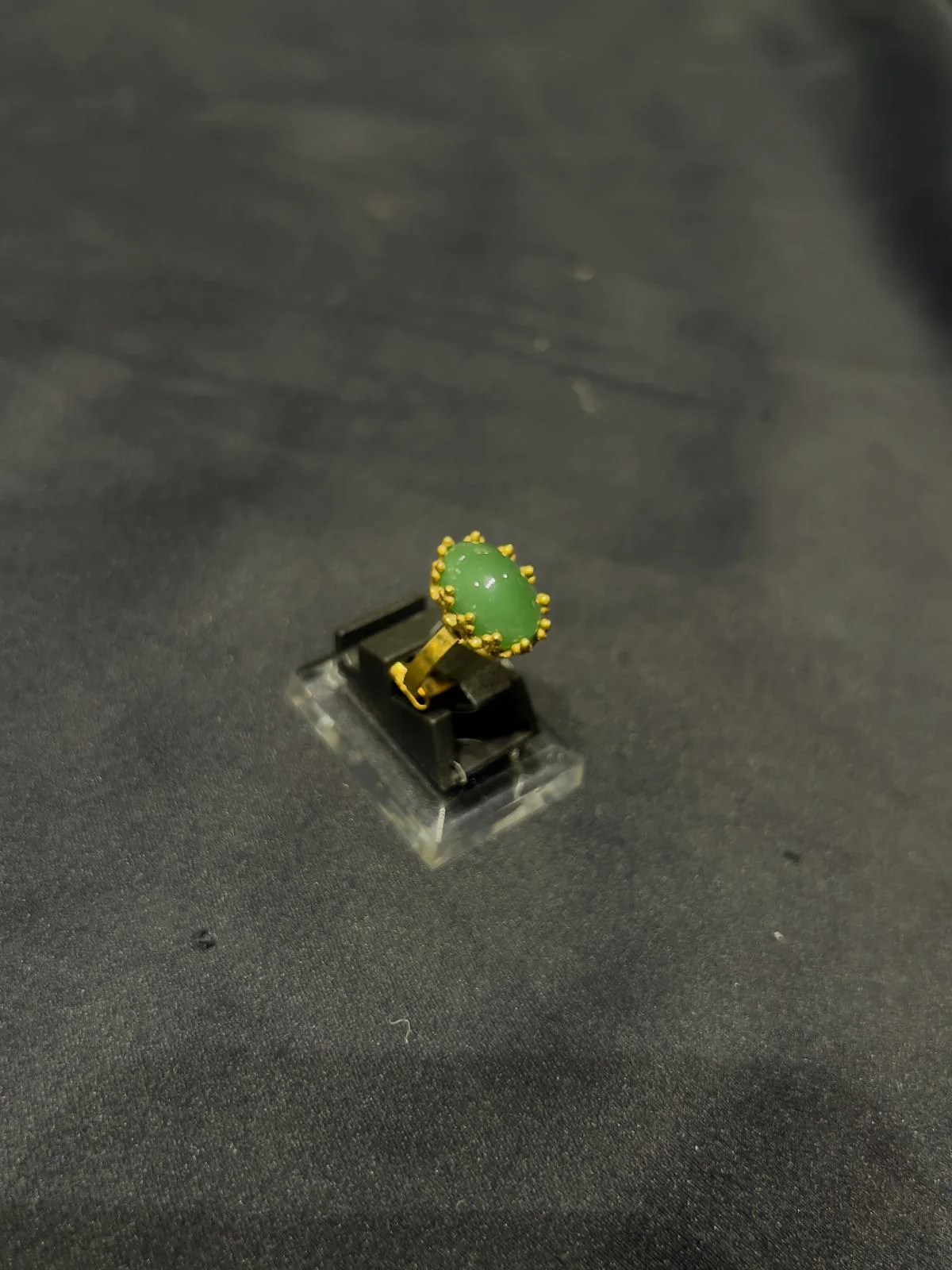 Goldplated adjustable Ring with green stone