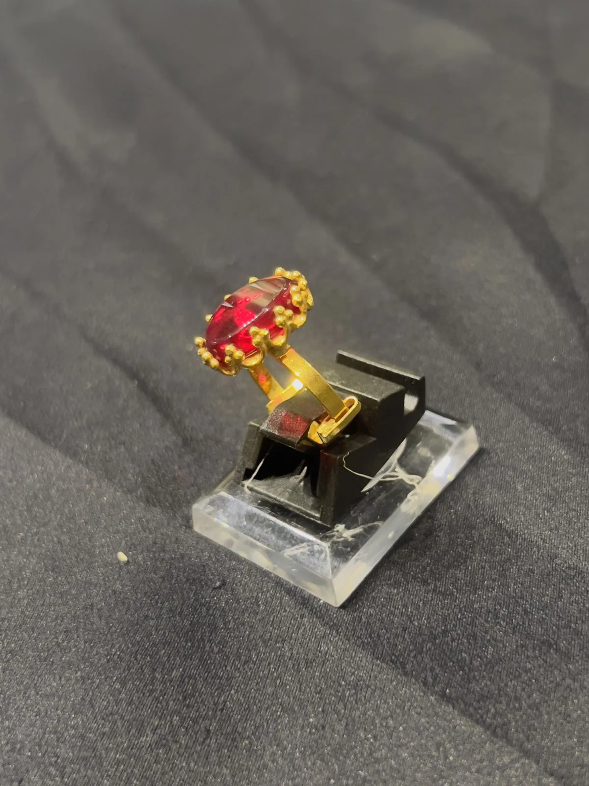 Goldplated adjustable Ring with red stone