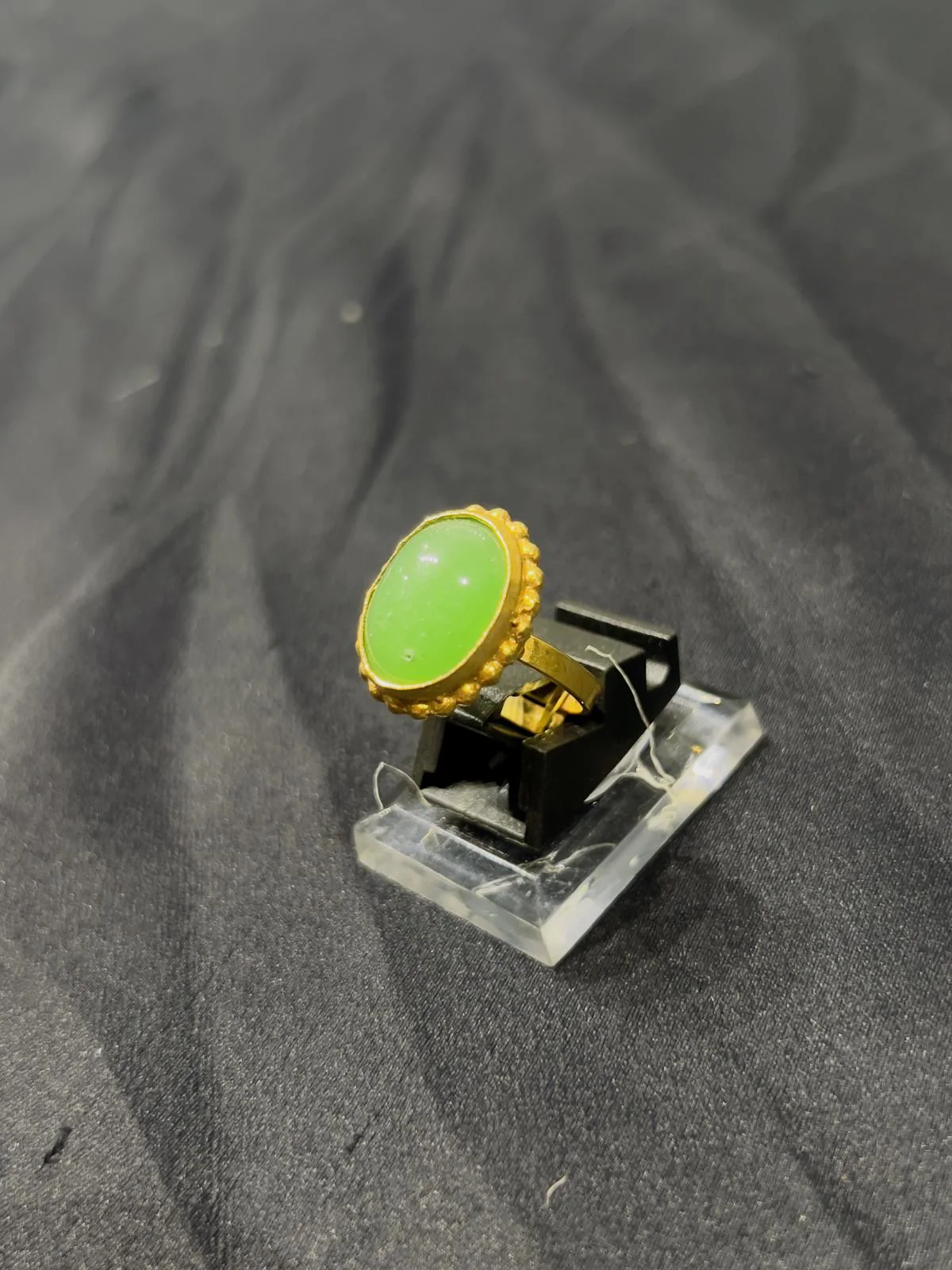 Goldplated adjustable Ring with green stone