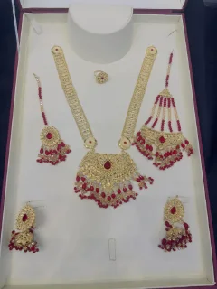 Beautiful gold polish mala with jhumar tikka  in real goldlook view 1